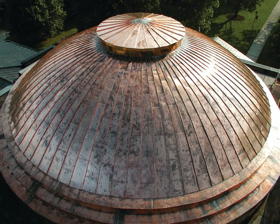 Craftsman Roofing crew installing a new roof in University of Miami